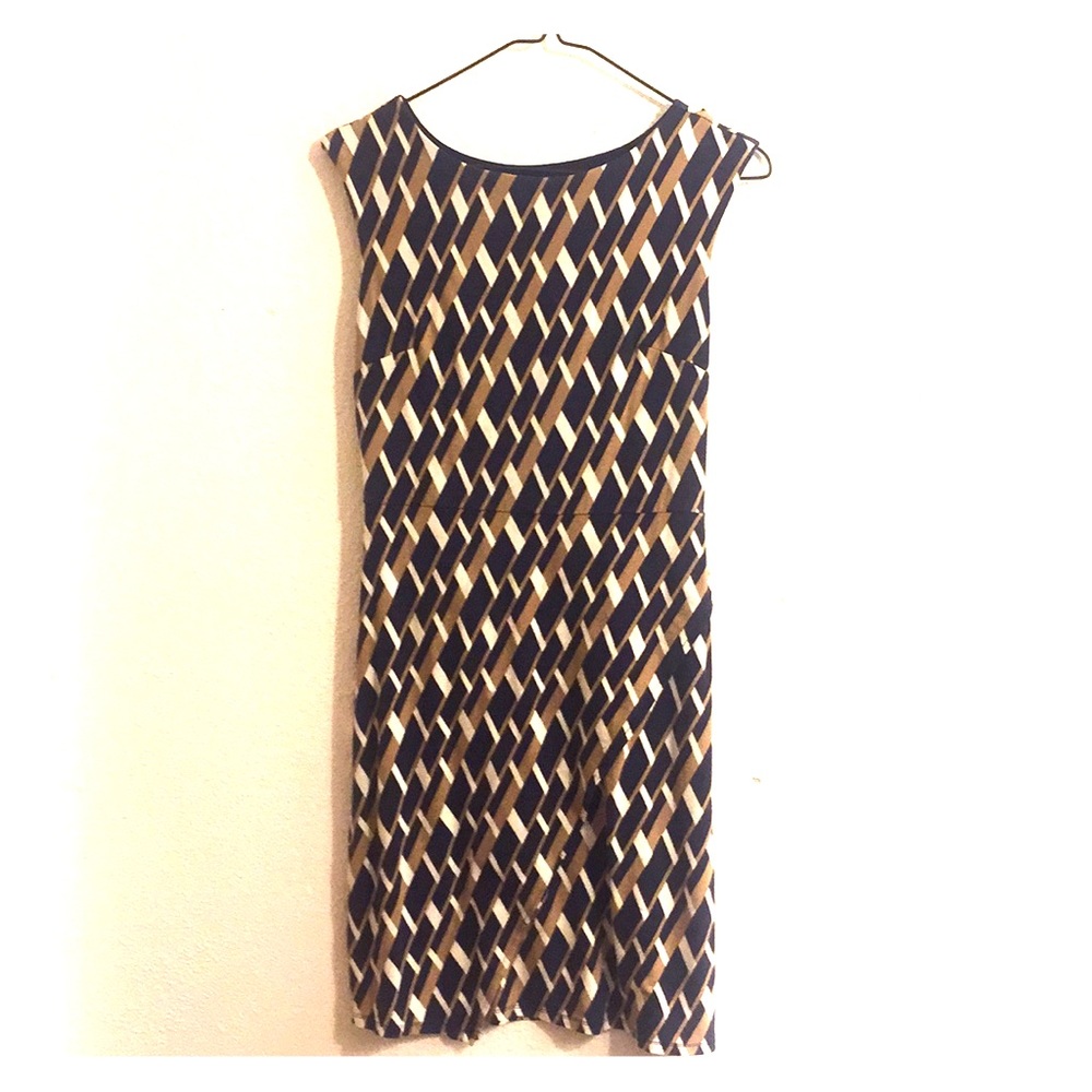A tan and blue patterned dress